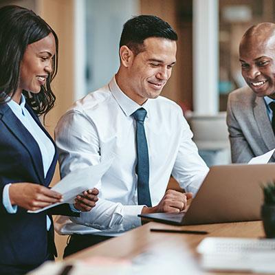 Business people discussing a person specification in an office